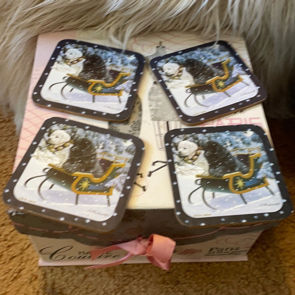 Puppies in sleigh cork holiday coasters